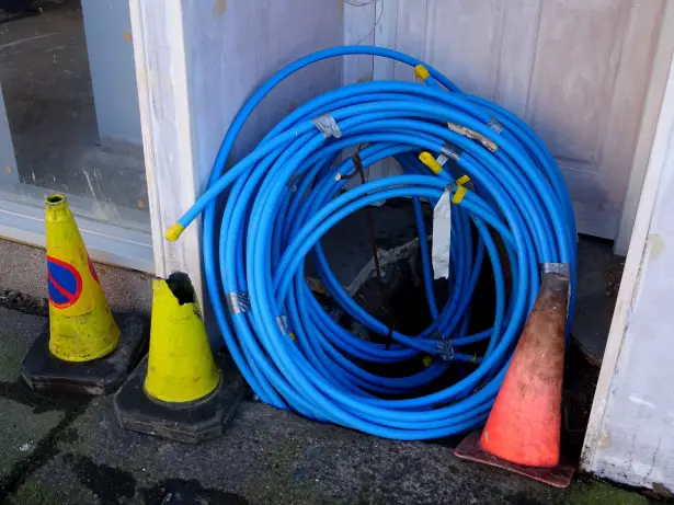 Hose siphon is the more cost-effective method